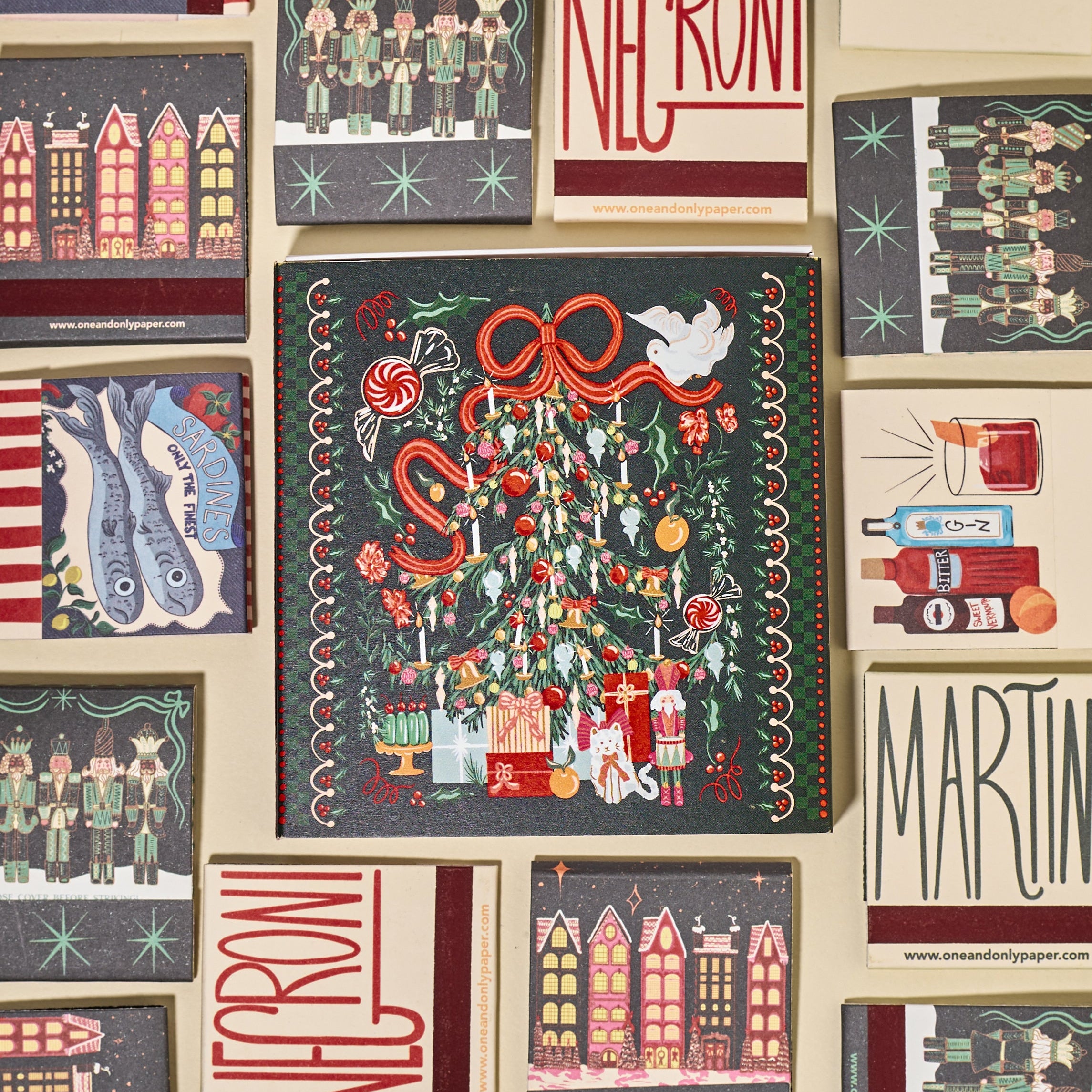 matchbooks sitting on a shelf with a white bust and a disco ball