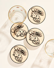 Whimsical star-adorned rabbit illustrated coaster, set of four