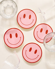 Peach and tomato smiley face coasters with retro color palette, set of four