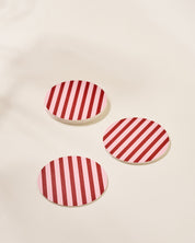Pink and maroon striped coaster, set of four
